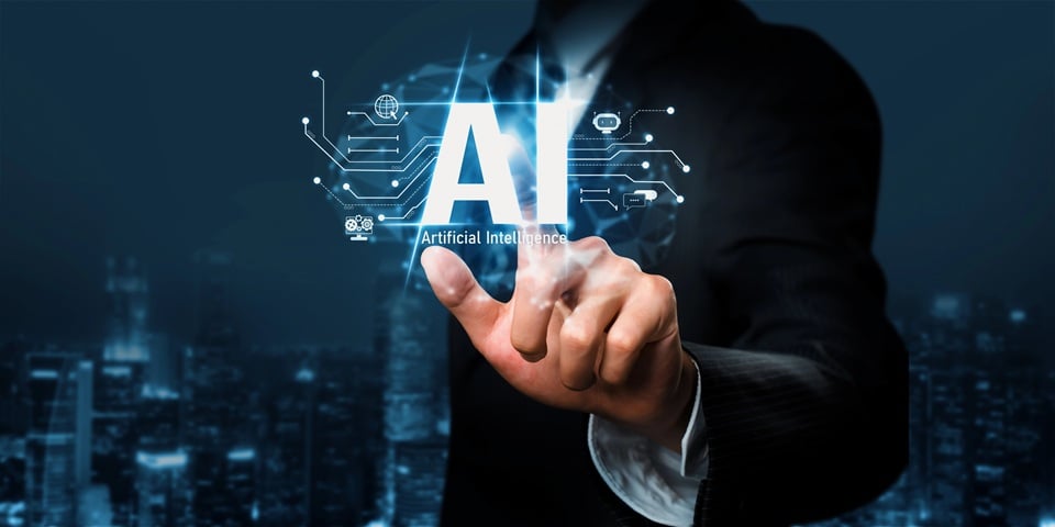 Businessperson pointing at a digital interface with "Artificial Intelligence" text, symbolizing AI technology integration in a corporate environment, over a cityscape background