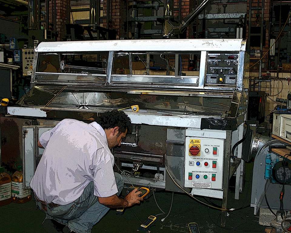 Employee testing a catering equipment